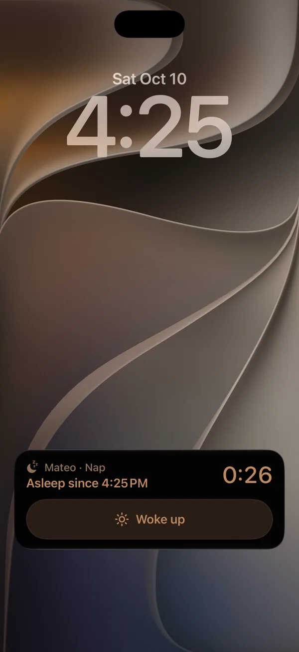iPhone Lock Screen with Velita's Live Activity showing the sleep in progress and its buttons